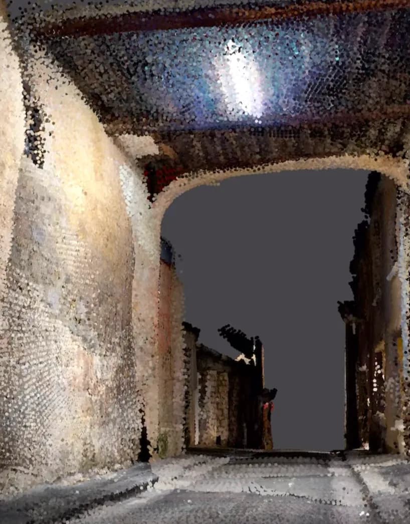 3D point-cloud reconstruction of a narrow street passing under an arch, at night